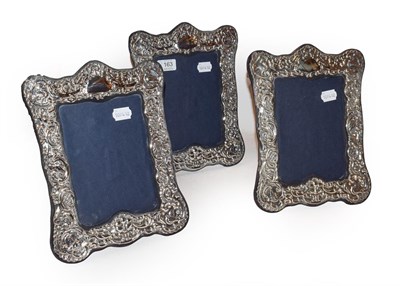 Lot 163 - A set of three silver photograph frames marked for London, each 29cm by 23cm