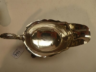 Lot 164 - Two George V silver sauce boats, one marked for Chester 1916 by Barker Brothers, the other...