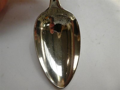 Lot 166 - A pair of George III silver basting spoons, makers marks rubbed, London 1802, 237 grams