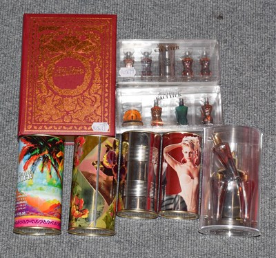 Lot 172 - Jean Paul Gaultier perfumes including a faux book enclosing scent and cream and a book 'Les...