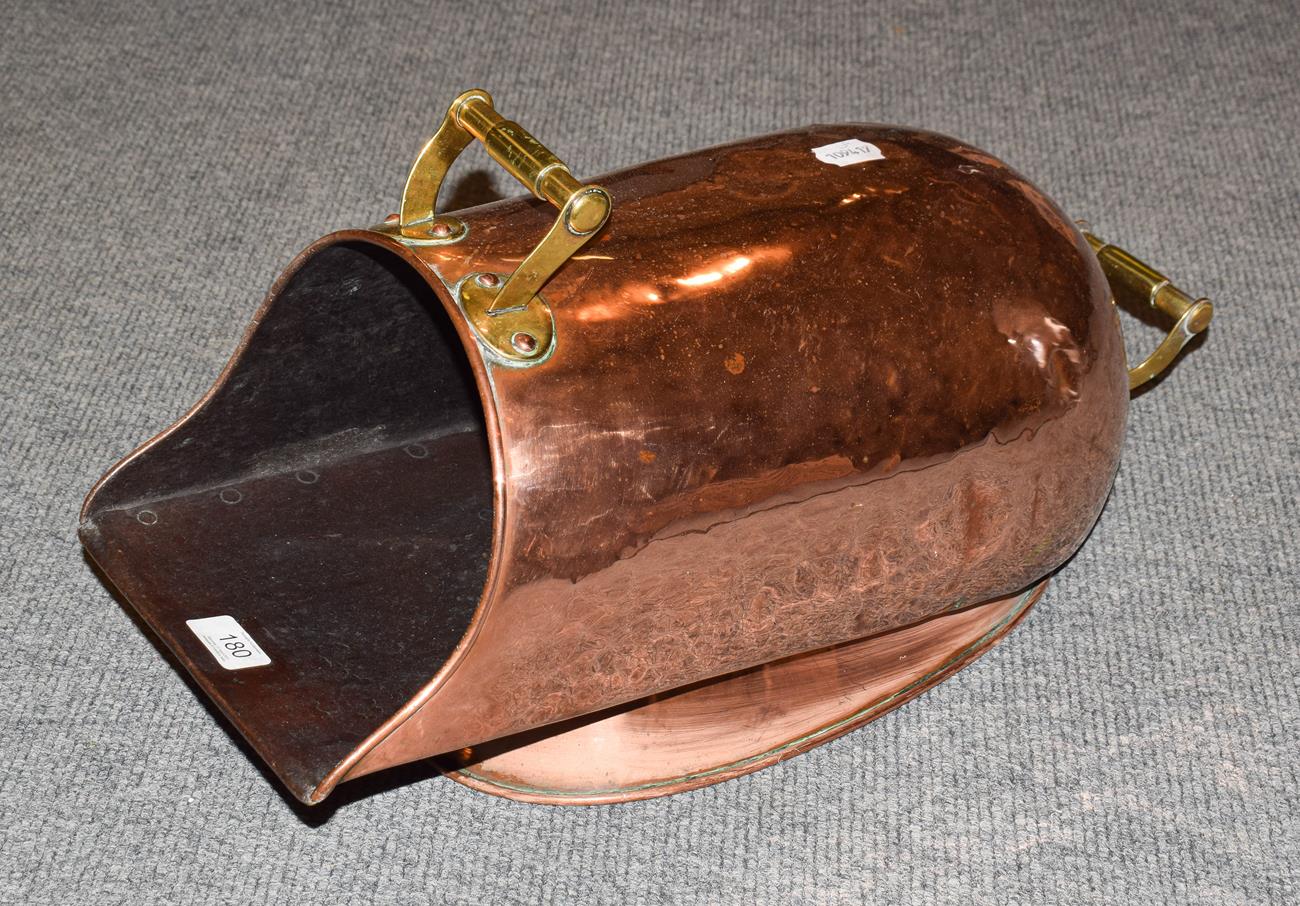Lot 180 - A 19th century copper coal scuttle of squat form, bearing impressed maker's mark James Ainsley,...