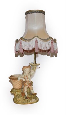 Lot 194 - A Royal Worcester shot silk lamp of a boy with a spade by a basket and tree with original shade...
