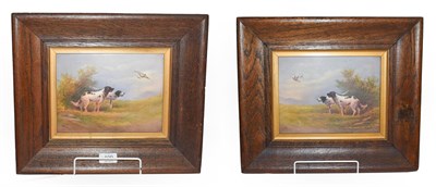 Lot 199 - A pair of 20th century Crown Devon fielding porcelain plaque painted with scenes of gun dogs in...