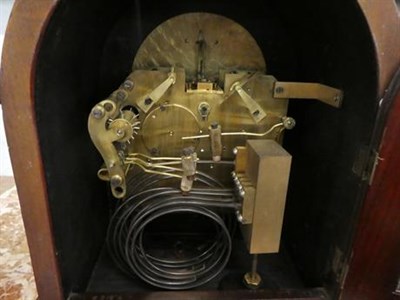Lot 219 - A mahogany quarter chiming mantel clock, retailed by W. Greenwood & Sons, Leeds & Huddersfield,...