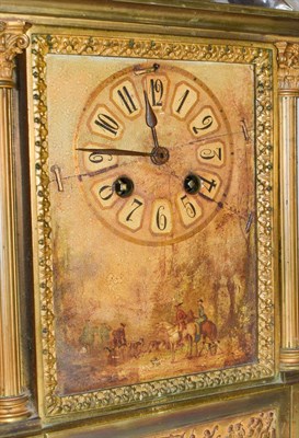 Lot 233 - A Japy Freres brass and gilt mantel clock with an eight day movement and a hand painted figural...