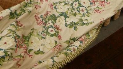 Lot 248 - A pair of curtains 300cm drop, decorated honeysuckle and roses on a white ground together with...