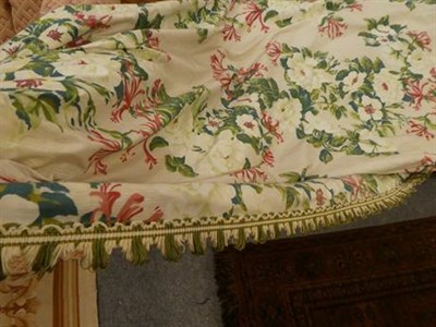 Lot 248 - A pair of curtains 300cm drop, decorated honeysuckle and roses on a white ground together with...