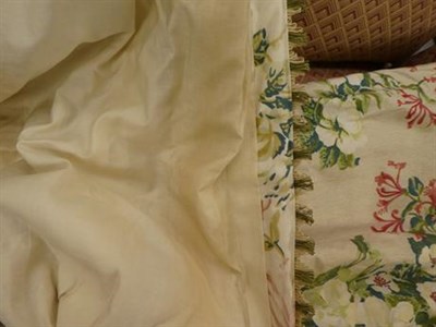 Lot 248 - A pair of curtains 300cm drop, decorated honeysuckle and roses on a white ground together with...