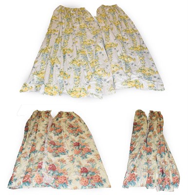 Lot 249 - Three pairs of curtains, one with ribbon ties of yellow roses and tie backs, approximately...