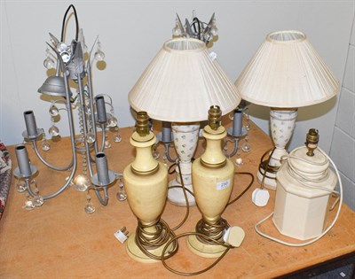 Lot 250 - Two pairs of modern table lamps together with a single table lamp and a pair of five light...