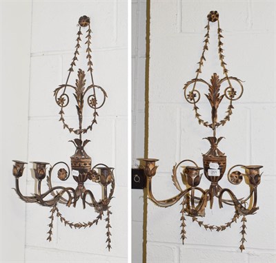Lot 251 - A pair of reproduction Adams style reproduction wall sconces 76cm, together with a brass art...
