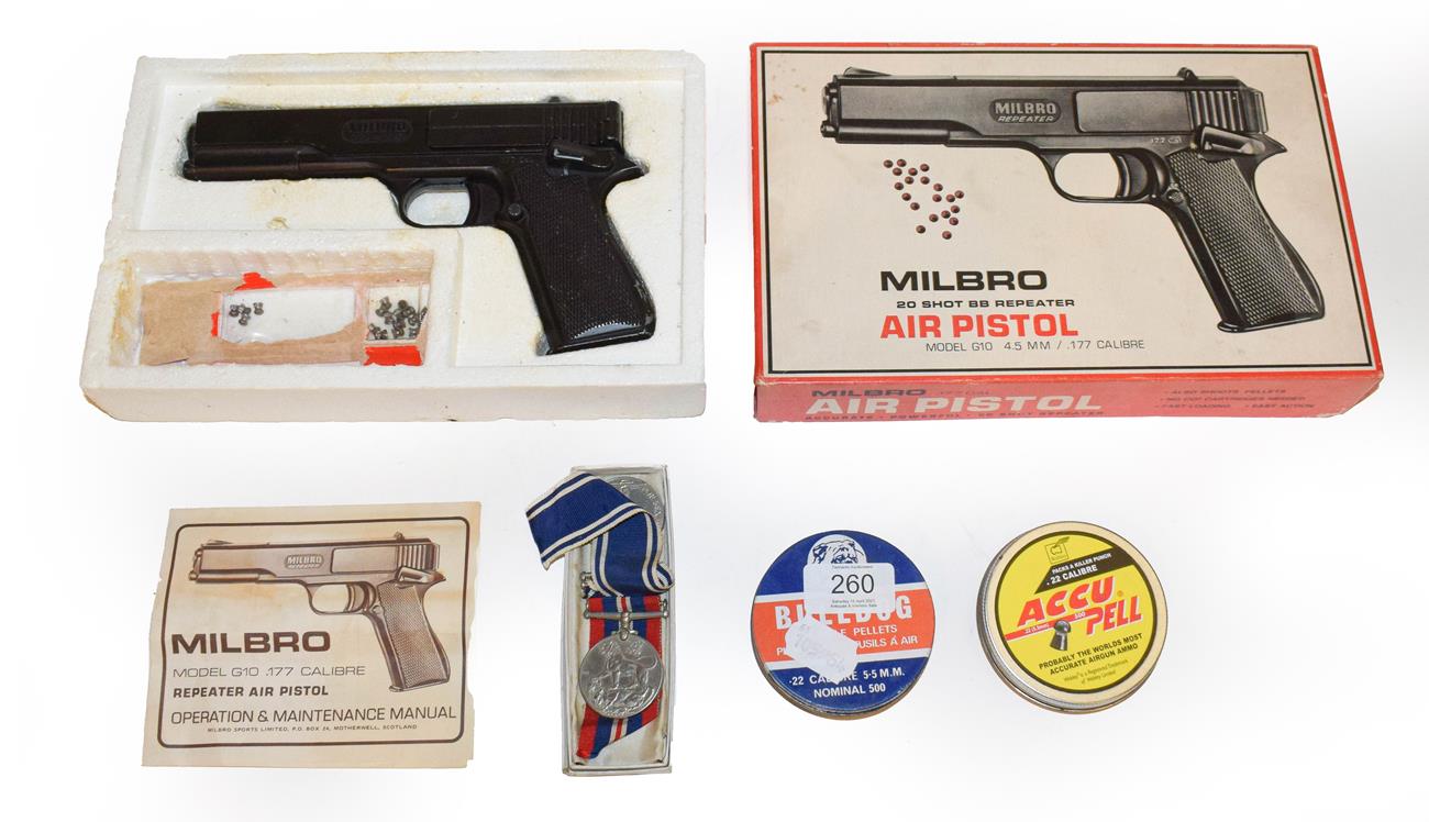 Lot 260 - Buyer must be over 18 years old - A Milbro air pistol and a medal presented to Sargent Samuel...