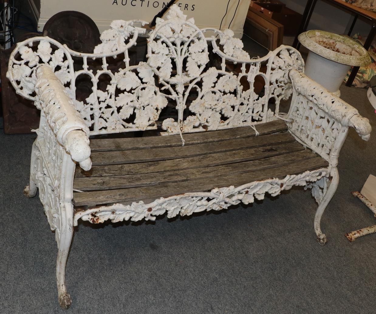 Lot 1059 - 19th century Coalbrookdale style white painted cast iron garden bench (a.f.) 150cm wide