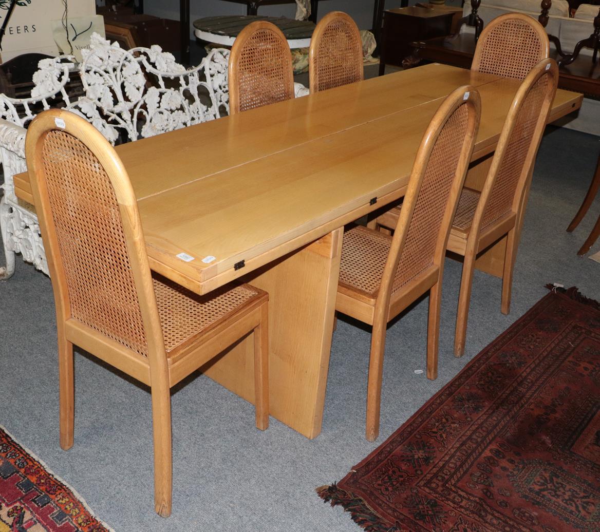 Lot 1060 - A modern Italian bleached oak dining table, the 7ft 5'' rectangular top with two fold out...