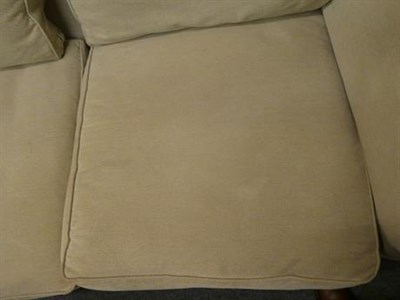 Lot 1063 - A Laura Ashley three seater sofa in cream fabric 180cm long, together with a matching two...