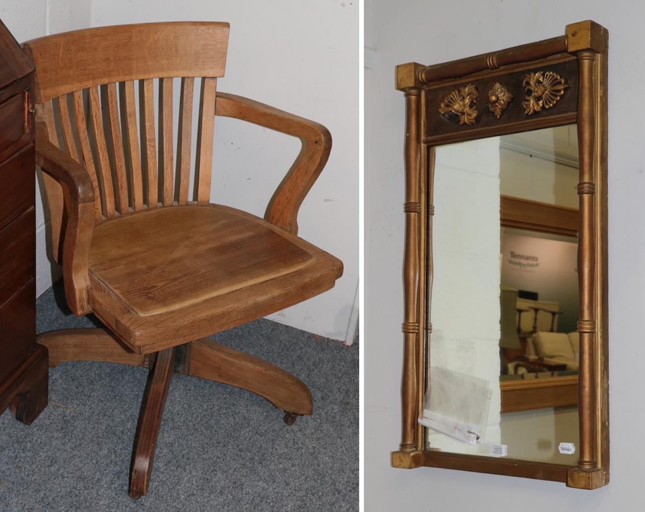 Lot 1072 - An oak 1920's desk chair with a swivel action and a gilt wood Regency style wall mirror 49cm by...