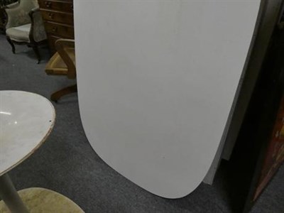Lot 1073 - A white Eero Saarinen style pedestal or 'tulip' table 140cm by 90cm by 73cm