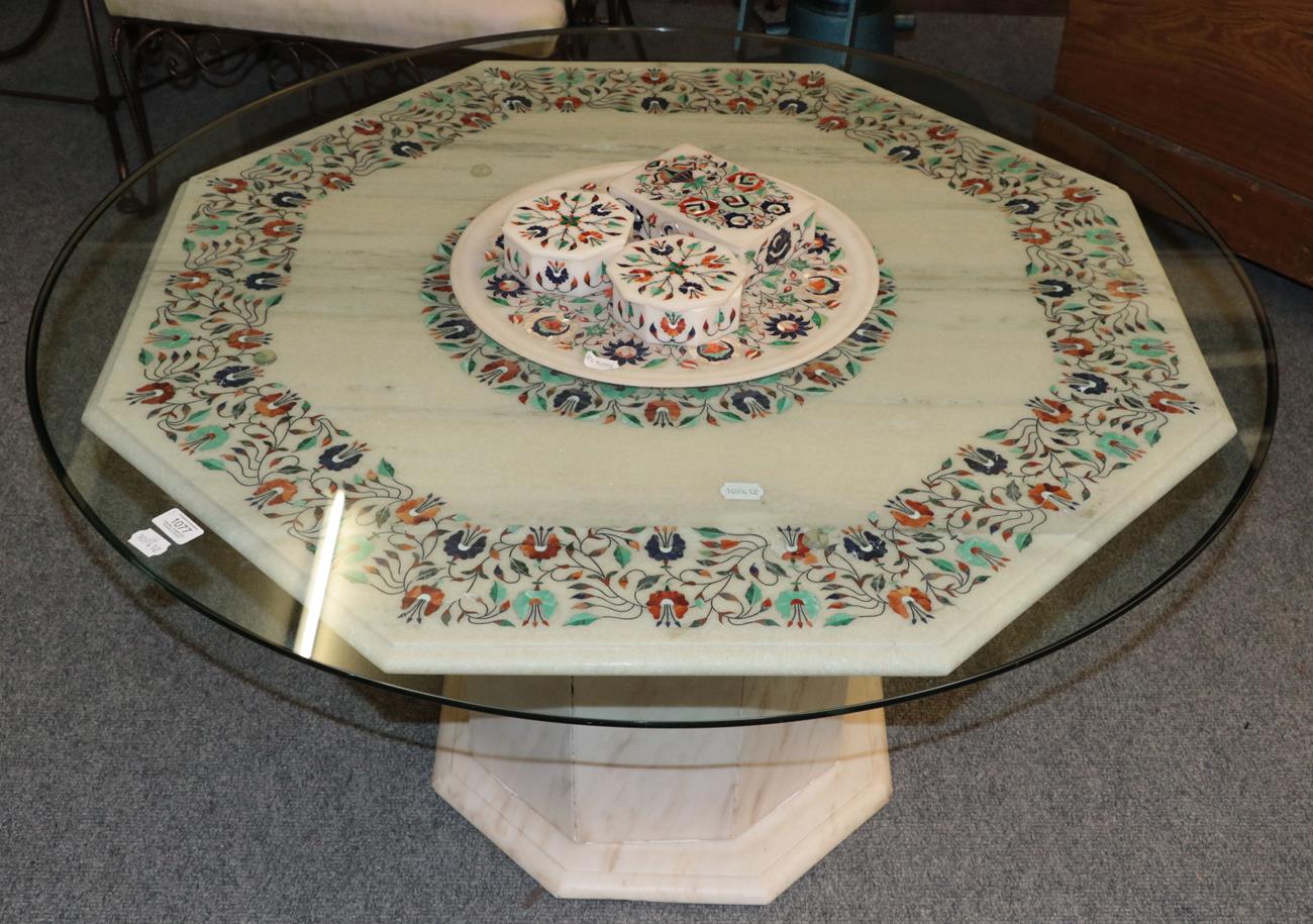 Lot 1077 - A modern pietra dura octagonal pedestal coffee table with circular glass top 105cm diameter by 55cm