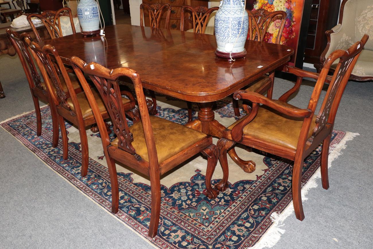 Lot 1078 - A burwood pedestal dining table 210cm by 110cm by 77cm together with a set of eight chairs...