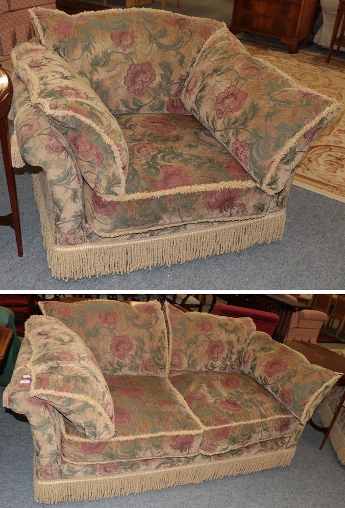 Lot 1084 - A chenille upholstered two-seater settee with bolster cushions and in stylised floral design, 193cm