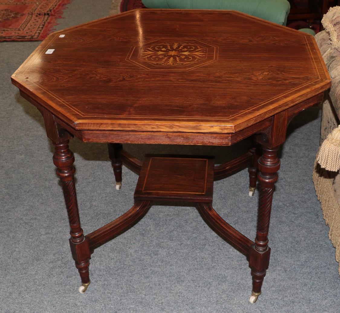 Lot 1085 - An Edwardian satin wood inlaid rosewood octagonal centre table with shelf stretcher 91cms by 76cm