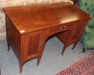 Lot 1089 - An Edwardian dressing table, the rectangular top over a single drawer above a knee hole flanked...