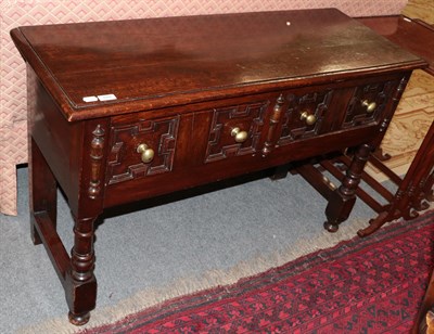 Lot 1092 - A small oak sideboard in 17th century style with geometric design 121cm by 44cm by 77cm