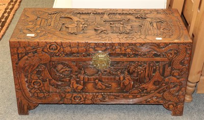 Lot 1096 - A Chinese carved camphor wood chest 94cm by 44cm by 50cm