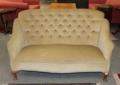 Lot 1105 - A small button back sofa, 150cm by 70cm by 86cm