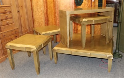 Lot 1112 - A set of three Deco style tables 70cm square by 63cm together with a larger matching low table...