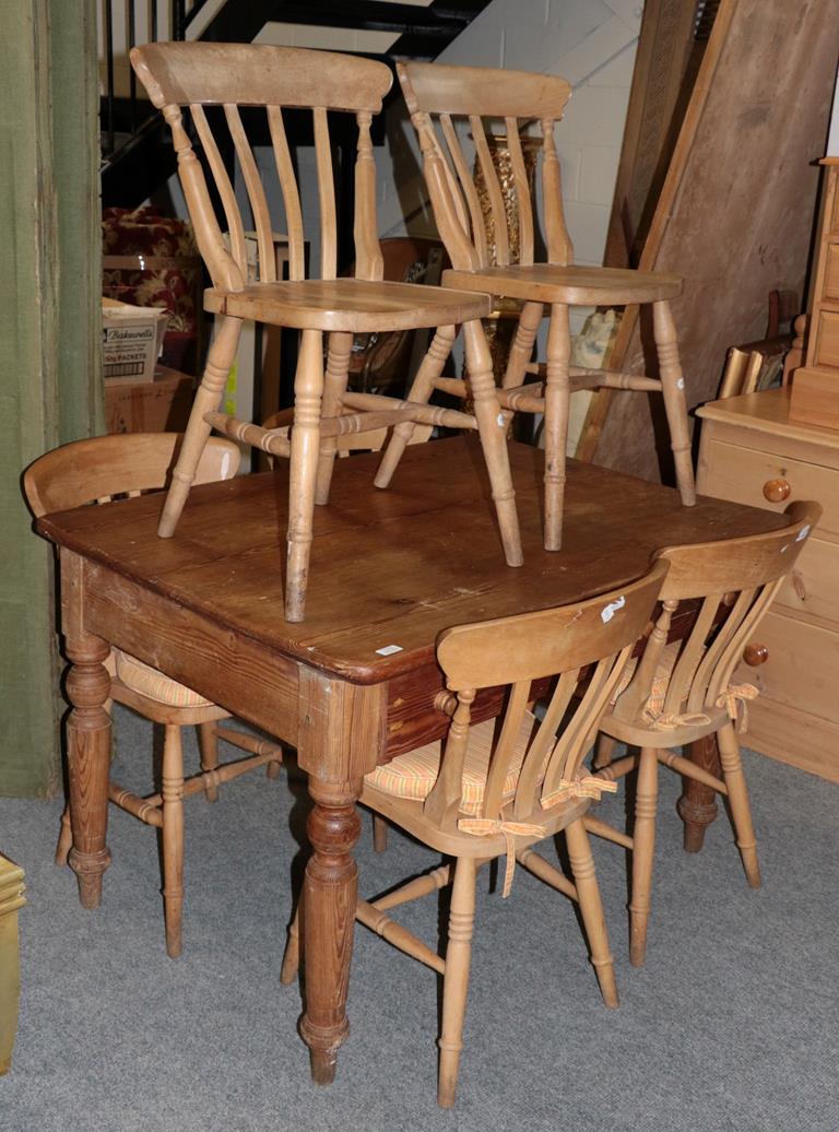 Lot 1113 - A 19th century pine farmhouse table 121cm by 90cm by 77cm with a set of six pine chairs