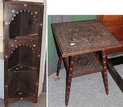 Lot 1121 - A Moroccan style inlaid and carved standing corner bookcase 63cm by 33cm by 174cm and similar...
