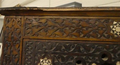 Lot 1121 - A Moroccan style inlaid and carved standing corner bookcase 63cm by 33cm by 174cm and similar...