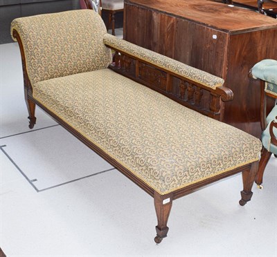Lot 1134 - A Victorian oak framed chaise longue 180cms