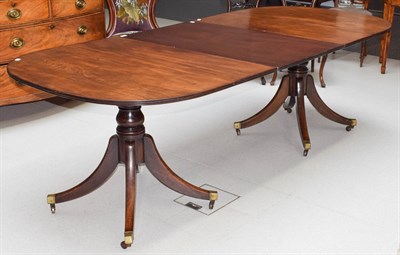 Lot 1138 - 19th century regency design mahogany twin pedestal dining table with baluster columns and down...