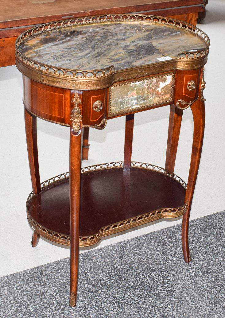 Lot 1142 - A reproduction French inlaid brass mounted marble topped reinform bed side table with gallery shelf