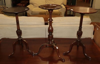 Lot 1144 - Three mahogany wine tables, tallest 63cm