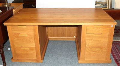 Lot 1154 - A bespoke light oak kneehole desk 170cm by 90cm by 77cm