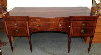 Lot 1155 - An George III inlaid and cross banded mahogany bow fronted sideboard 186cm by 77cm by 91cm