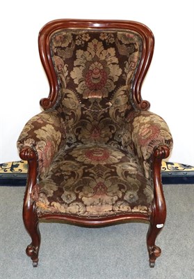 Lot 1162 - A Victorian carved mahogany bedroom armchair, raised upon scroll supports, 70cm by 70cm by...