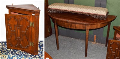 Lot 1174 - A Victorian carved mahogany long footstool, 115cm together with a Georgian mahogany D-end side...