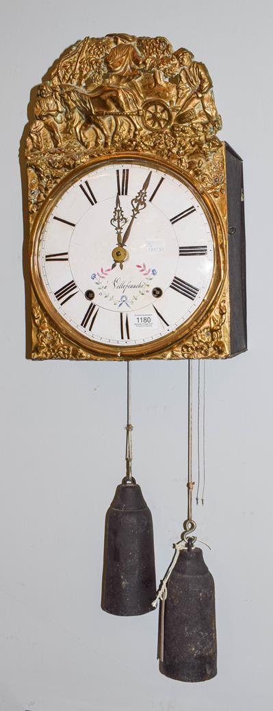 Lot 1180 - A 19th century French brass wall clock with enamel dial, striking on a bell and with pull repeater