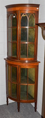Lot 1184 - An Edwardian inlaid mahogany glazed standing corner cupboard, 75cm by 52cm by 206cm