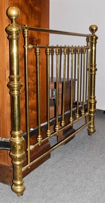 Lot 1192 - A Victorian brass framed half tester double bed, 137cm wide, 205cm long, approx 230cm high