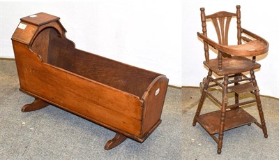 Lot 1196 - A 19th century doll's cradle and a metamorphic high chair (2)