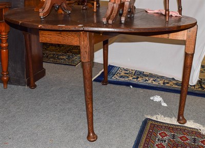 Lot 1209 - A George II style oak gateleg table, 126cm by 134cm by 72cm