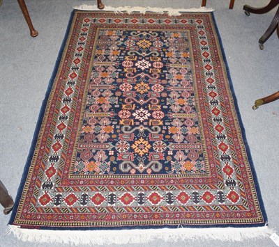Lot 1223 - A good modern Azeri Perepedil design Rug, the indigo field with typical rams horn devices...