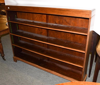 Lot 1244 - A mahogany open bookshelf with three adjustable shelves, 153cm by 25cm by 121cm