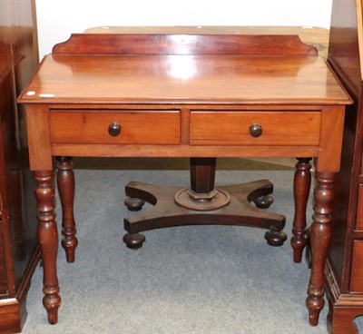 Lot 1258 - A mahogany 19th century side table with drawers on turned legs, 91cm by 50cm by 81cm