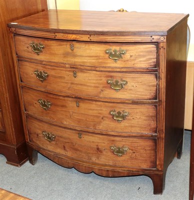Lot 1270 - A George III inlaid mahogany bow front four high chest of drawers, 102cm by 59cm by 102cm